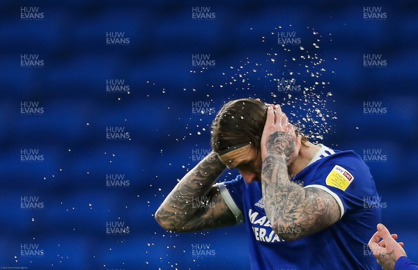 300121 - Cardiff City v Millwall, Sky Bet Championship - Aden Flint of Cardiff City cools down during the match