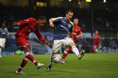 26.08.08...Cardiff City v MK Dons, Carling Cup Round 2 -  Cardiff's Ross McCormack challenges M K Dons Shaun Cummings 