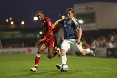 26.08.08...Cardiff City v MK Dons, Carling Cup Round 2 -  Cardiff's Paul Parry takes on M K Dons Shaun Cummings 