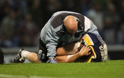 26.08.08...Cardiff City v MK Dons, Carling Cup Round 2 -  Cardiff's Riccy Scimeca receives treatment after injury 