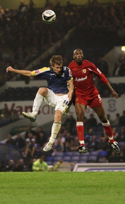 26.08.08...Cardiff City v MK Dons, Carling Cup Round 2 -  Cardiff's Paul Parry wins the ball from M K Dons Drissa Diallo 