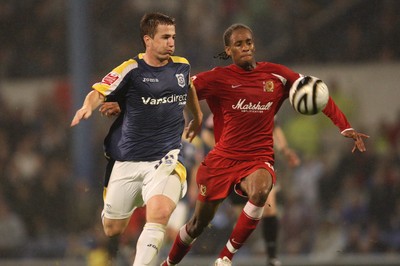 26.08.08...Cardiff City v MK Dons, Carling Cup Round 2 -  Cardiff's Ross McCormack fires shot at goal as M K Dons Shaun Cummings challenges 