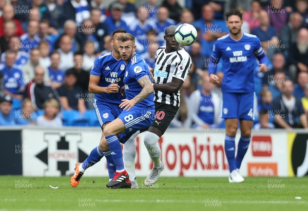 180818 - Cardiff City v Newcastle United, Premier League - Joe Ralls of Cardiff City and Mohamed Diame of Newcastle United compete for the ball
