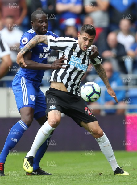 180818 - Cardiff City v Newcastle United, Premier League - Sol Bamba of Cardiff City and Joselu of Newcastle United compete for the ball