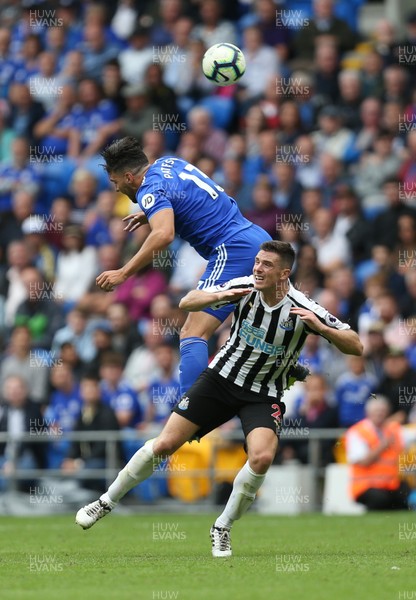 180818 - Cardiff City v Newcastle United, Premier League - Callum Paterson of Cardiff City gets above Ciaran Clark of Newcastle United as they compete for the ball