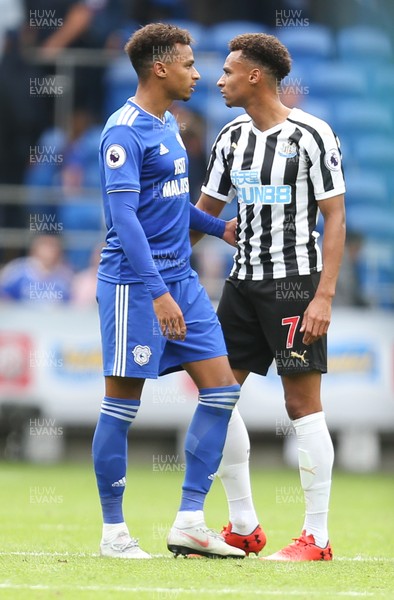 180818 - Cardiff City v Newcastle United, Premier League - Twin brothers Josh Murphy of Cardiff City and Jacob Murphy of Newcastle United together after the final whistle
