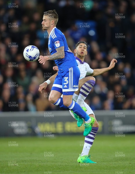 280417 - Cardiff City v Newcastle United, Sky Bet Championship - Joe Bennett of Cardiff City wins the ball from Ayoze Perez of Newcastle United