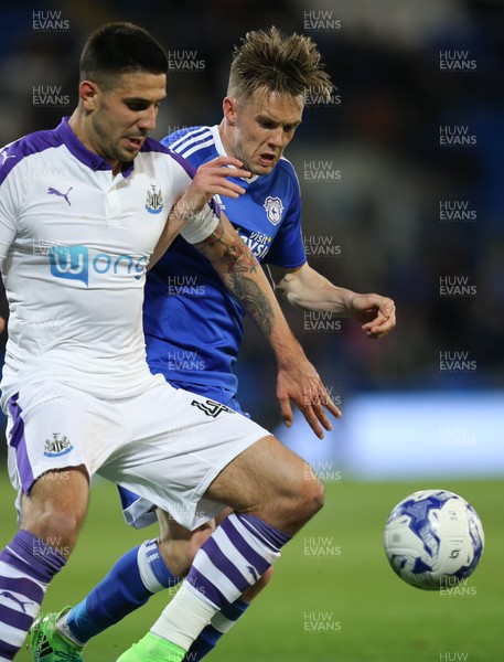 280417 - Cardiff City v Newcastle United, Sky Bet Championship - Craig Noone of Cardiff City is challenged by Aleksander Mitrovic of Newcastle United