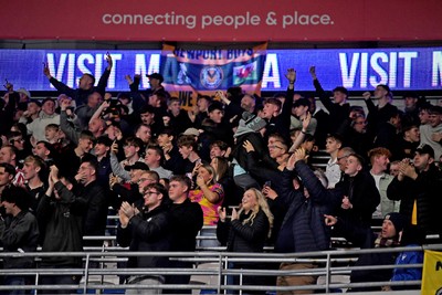 071025 - Cardiff City v Newport County - Vertu Trophy Group Stage - Newport fans celebrate after Tom Davies of Newport County scores the first goal of the game