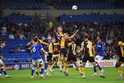 071025 - Cardiff City v Newport County - Vertu Trophy Group Stage - Lee Jenkins of Newport County wins the header