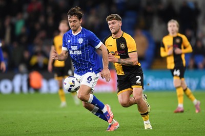 071025 - Cardiff City v Newport County - Vertu Trophy Group Stage - Cameron Evans of Newport County is challenged by Ryan Wintle of Cardiff City