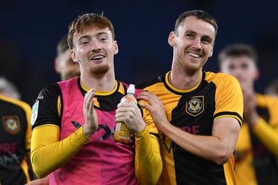 071025 - Cardiff City v Newport County - Vertu Trophy Group Stage - Michael Spellman of Newport County and Ciaran Brennan of Newport County celebrate the win at full time