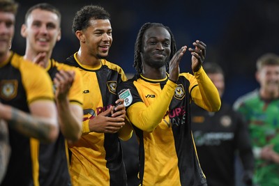 071025 - Cardiff City v Newport County - Vertu Trophy Group Stage - Jaden Warner of Newport County and Cameron Antwi of Newport County celebrate the win at full time