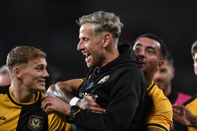 071025 - Cardiff City v Newport County - Vertu Trophy Group Stage - Newport County Manager, David Hughes celebrates the win with his team at full time
