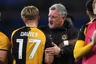 071025 - Cardiff City v Newport County - Vertu Trophy Group Stage - Tom Davies of Newport County is congratulated by Newport County Assistant Manager, Wayne Hatswell at full time