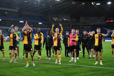 071025 - Cardiff City v Newport County - Vertu Trophy Group Stage - Newport players celebrate with their fans at full time