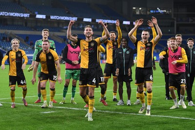 071025 - Cardiff City v Newport County - Vertu Trophy Group Stage - Newport players celebrate with their fans at full time