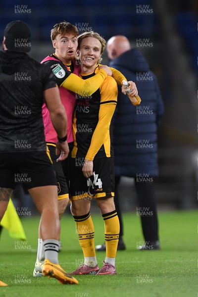 071025 - Cardiff City v Newport County - Vertu Trophy Group Stage - Michael Spellman of Newport County and Sam Braybrooke of Newport County celebrate the win at full time