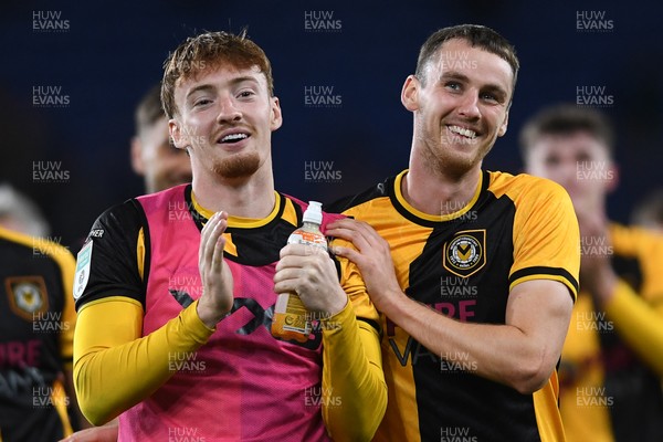 071025 - Cardiff City v Newport County - Vertu Trophy Group Stage - Michael Spellman of Newport County and Ciaran Brennan of Newport County celebrate the win at full time