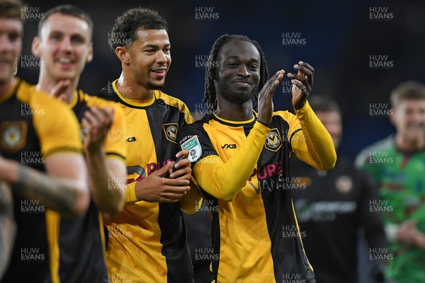 071025 - Cardiff City v Newport County - Vertu Trophy Group Stage - Jaden Warner of Newport County and Cameron Antwi of Newport County celebrate the win at full time