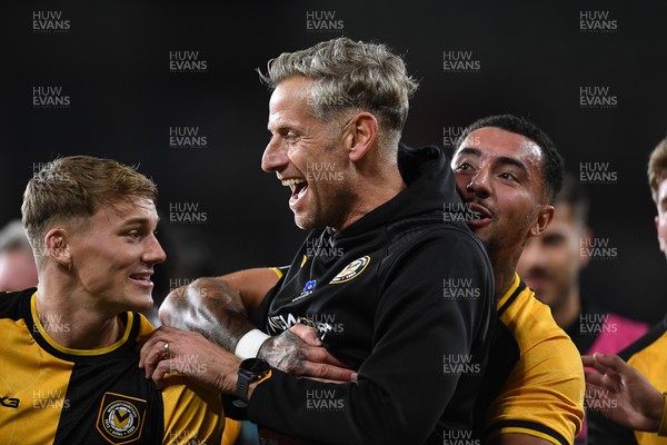071025 - Cardiff City v Newport County - Vertu Trophy Group Stage - Newport County Manager, David Hughes celebrates the win with his team at full time