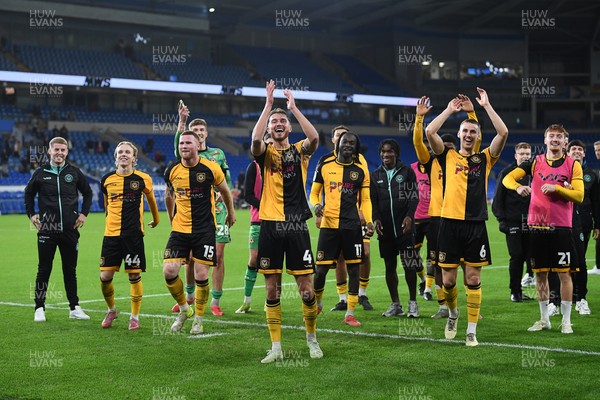 071025 - Cardiff City v Newport County - Vertu Trophy Group Stage - Newport players celebrate with their fans at full time