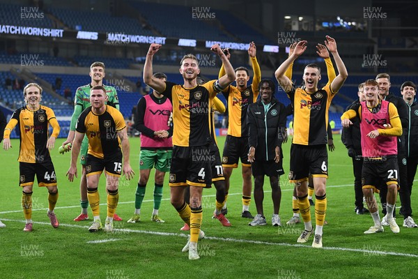 071025 - Cardiff City v Newport County - Vertu Trophy Group Stage - Newport players celebrate with their fans at full time