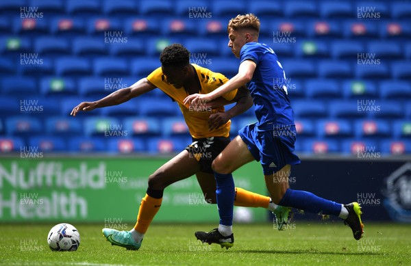 310721 - Cardiff City v Newport County - Preseason Friendly - Timmy Abraham of Newport County is tackled by Joel Bagan of Cardiff City