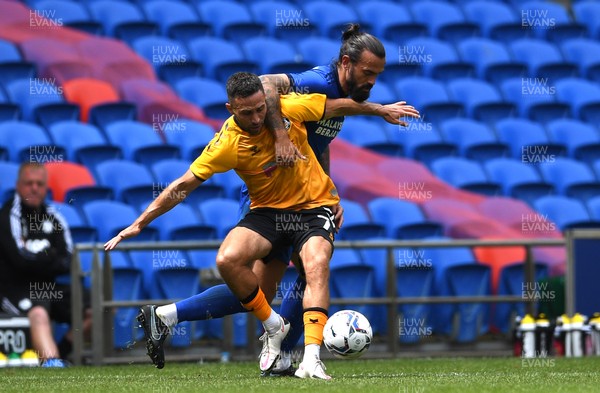 310721 - Cardiff City v Newport County - Preseason Friendly - Robbie Willmott of Newport County is tackled by Marlon Pack of Cardiff City