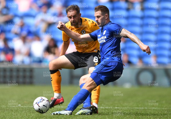 310721 - Cardiff City v Newport County - Preseason Friendly - James Collins of Cardiff City is challenged by Matthew Dolan