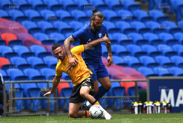 310721 - Cardiff City v Newport County - Preseason Friendly - Robbie Willmott of Newport County is tackled by Marlon Pack of Cardiff City