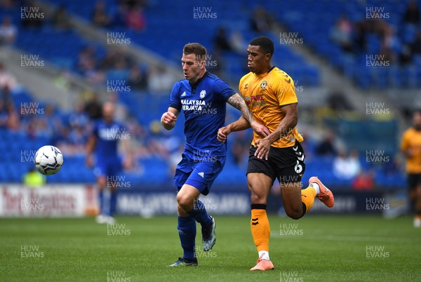 310721 - Cardiff City v Newport County - Preseason Friendly - James Collins of Cardiff City is challenged by Priestley Farquharson of Newport County