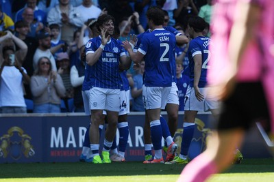 250426 - Cardiff City v Northampton Town - Sky Bet League 1 - Ollie Tanner of Cardiff City celebrates scoring a goal with team mates