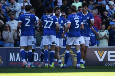 250426 - Cardiff City v Northampton Town - Sky Bet League 1 - Ollie Tanner of Cardiff City celebrates scoring a goal with team mates