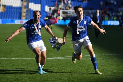 250426 - Cardiff City v Northampton Town - Sky Bet League 1 - Callum Robinson of Cardiff City and Joel Colwill of Cardiff City celebrate promotion at full time