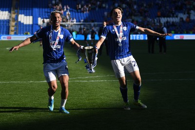 250426 - Cardiff City v Northampton Town - Sky Bet League 1 - Callum Robinson of Cardiff City and Joel Colwill of Cardiff City celebrate promotion at full time