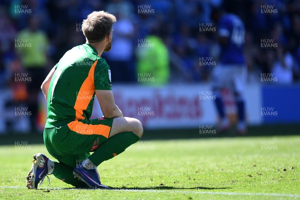 250426 - Cardiff City v Northampton Town - Sky Bet League 1 - Lee Burge of Northampton after conceding 