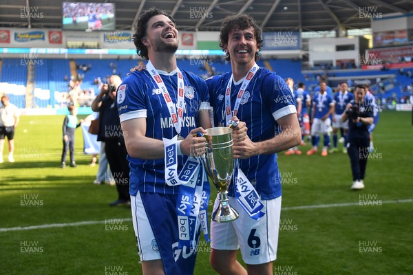 250426 - Cardiff City v Northampton Town - Sky Bet League 1 - Ollie Tanner of Cardiff City and Ryan Wintle of Cardiff City celebrate promotion at full time