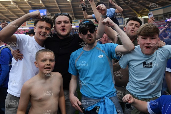 250426 - Cardiff City v Northampton Town - Sky Bet League 1 - Fans run onto the pitch at full time in celebration 