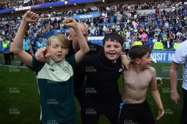 250426 - Cardiff City v Northampton Town - Sky Bet League 1 - Fans run onto the pitch at full time in celebration 