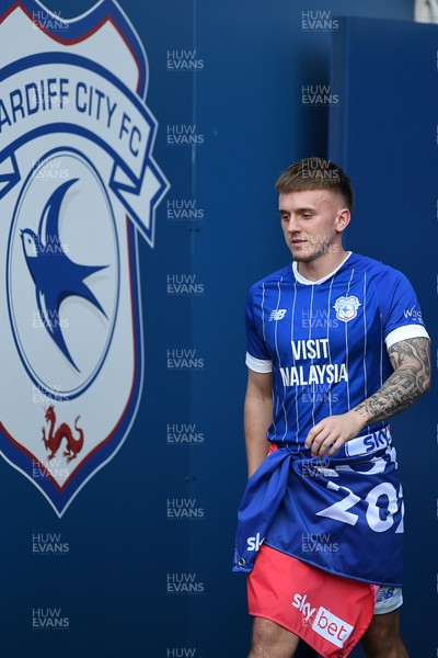 250426 - Cardiff City v Northampton Town - Sky Bet League 1 - Isaak Davies of Cardiff City walks out for the trophy lift at the end of the match