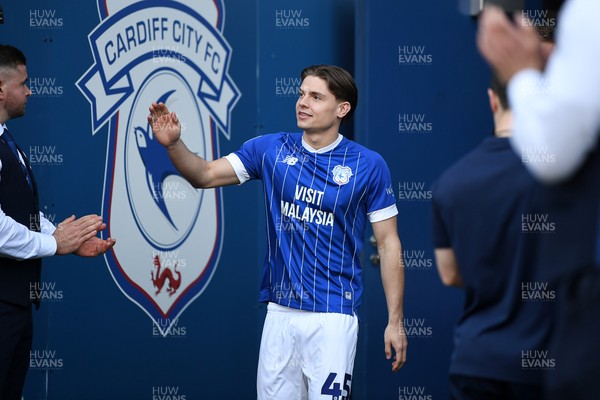 250426 - Cardiff City v Northampton Town - Sky Bet League 1 - Cian Ashford of Cardiff City walks out for the trophy lift at the end of the match