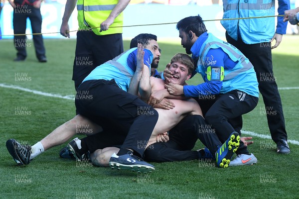 250426 - Cardiff City v Northampton Town - Sky Bet League 1 - pitch invader at full time