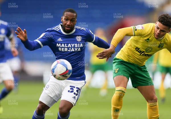 160121 - Cardiff City v Norwich City, Sky Bet Championship - Junior Hoilett of Cardiff City and Max Aarons of Norwich City compete for the ball