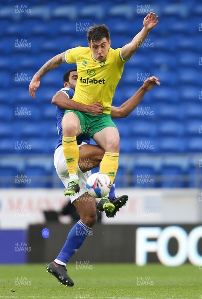 160121 - Cardiff City v Norwich City, Sky Bet Championship - Mario Vrancic of Norwich City and Curtis Nelson of Cardiff City compete for the ball