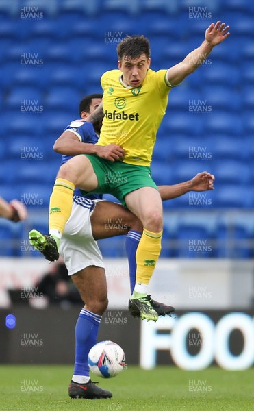 160121 - Cardiff City v Norwich City, Sky Bet Championship - Mario Vrancic of Norwich City and Curtis Nelson of Cardiff City compete for the ball