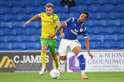 250826 - Cardiff City v Norwich City - Carabao Cup Second Round - Chris Willock of Cardiff City is challenged by Jack Stacey of Norwich