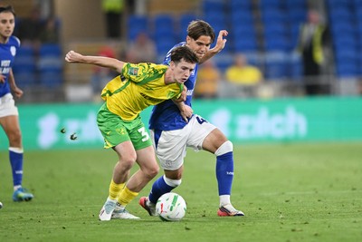 250826 - Cardiff City v Norwich City - Carabao Cup Second Round - Cian Ashford of Cardiff City is challenged by Kellen Fisher of Norwich