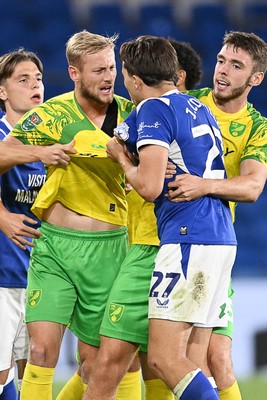 250826 - Cardiff City v Norwich City - Carabao Cup Second Round - Things heat up between Harry Darling of Norwich and Joel Colwill of Cardiff City