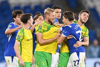 250826 - Cardiff City v Norwich City - Carabao Cup Second Round - Things heat up between Harry Darling of Norwich and Joel Colwill of Cardiff City